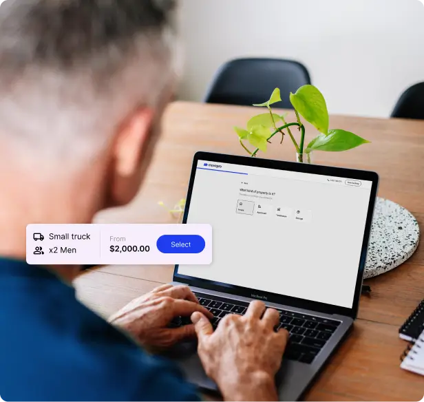 Man booking on laptop at night