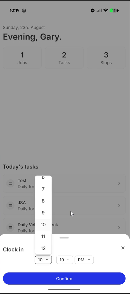 Clock in sheet with time pickers and confirm button