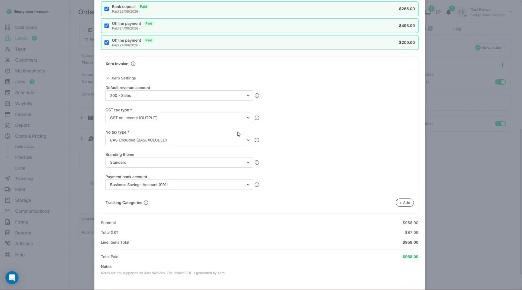 Xero settings expanded inside the invoice editor with default revenue account, tax types, branding theme and bank account