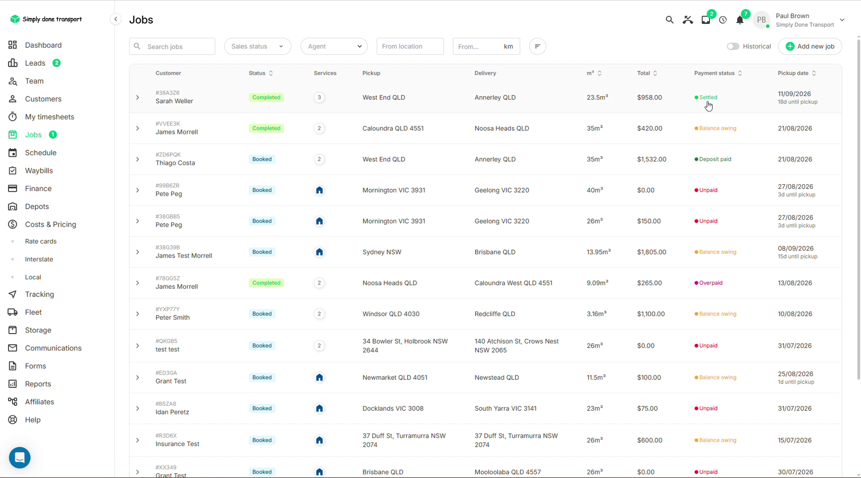 Jobs list with the payment status column showing settled, balance owing, deposit paid, unpaid and overpaid