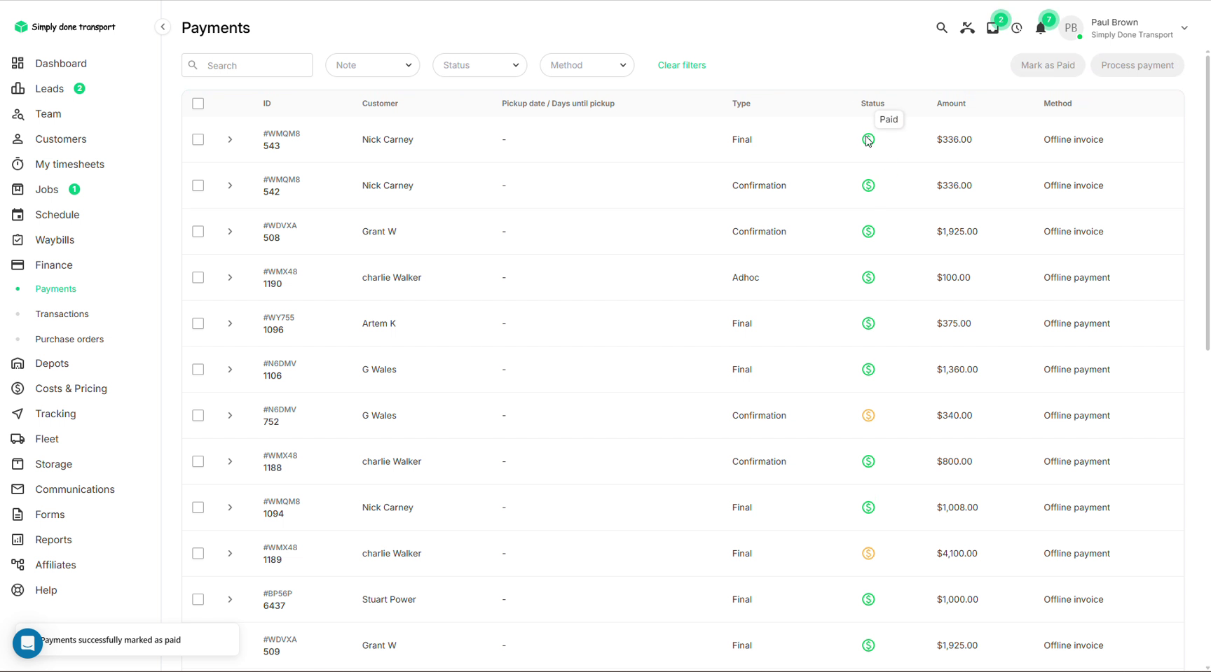 Finance payments list with type and status columns, Mark as Paid and Process payment buttons and a success toast
