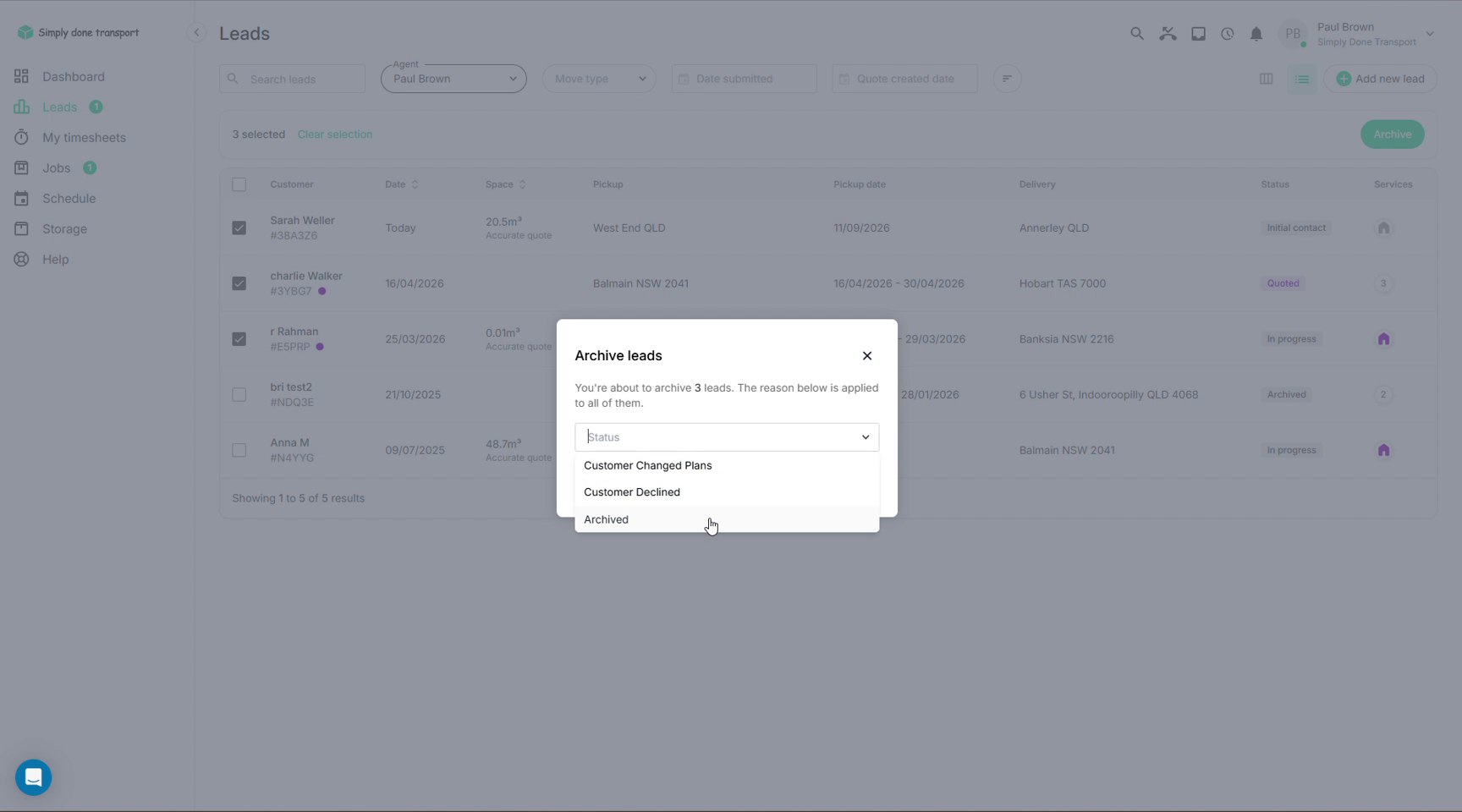 Archive leads dialog with reason dropdown over the leads list view