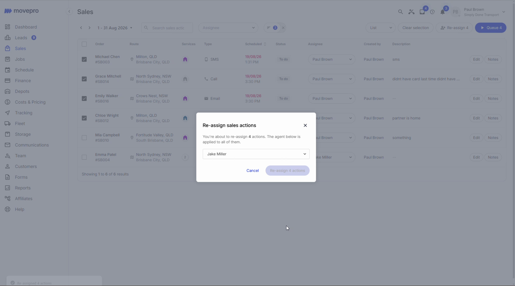 Re-assign sales actions dialog applying a new agent to four selected actions