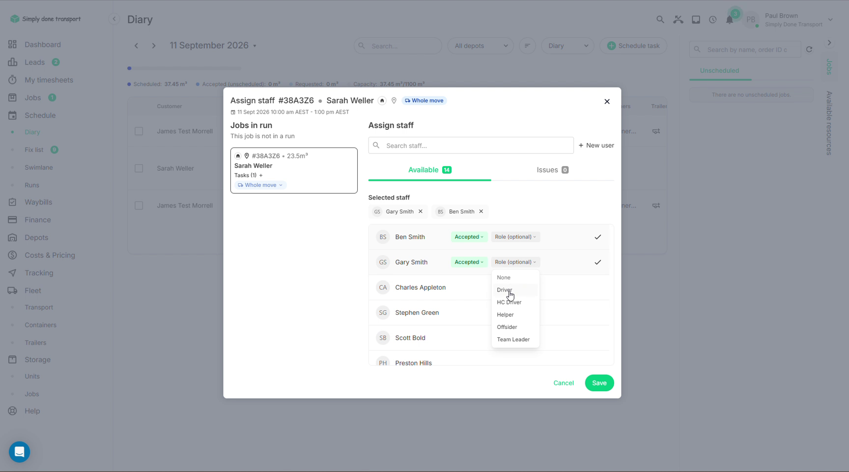 Assign staff dialog with selected crew, acceptance chips and the role dropdown